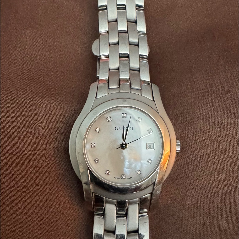 Authentic Gucci Silver Mother of Pearl Bracelet Watch with Crystal Accents
